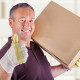 man carrying a moving box